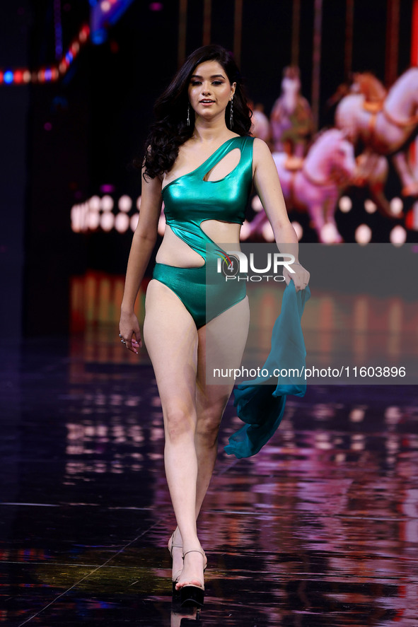 A contestant walks the ramp during the grand finale of Miss Universe India 2024 in Jaipur, Rajasthan, India, on September 22, 2024. 