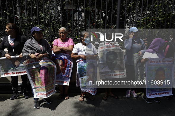 Mothers and fathers of the 43 missing students from Ayotzinapa protest outside the Ministry of the Interior in Mexico City, Mexico, on Septe...