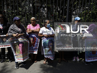 Mothers and fathers of the 43 missing students from Ayotzinapa protest outside the Ministry of the Interior in Mexico City, Mexico, on Septe...