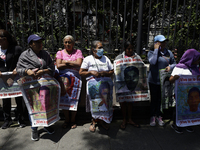 Mothers and fathers of the 43 missing students from Ayotzinapa protest outside the Ministry of the Interior in Mexico City, Mexico, on Septe...