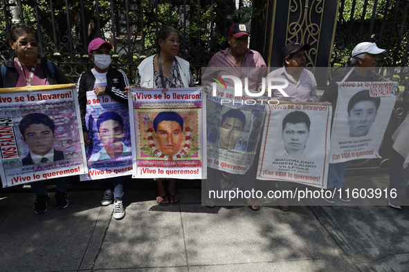 Mothers and fathers of the 43 missing students from Ayotzinapa protest outside the Ministry of the Interior in Mexico City, Mexico, on Septe...