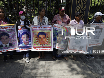 Mothers and fathers of the 43 missing students from Ayotzinapa protest outside the Ministry of the Interior in Mexico City, Mexico, on Septe...