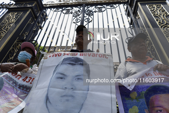 Mothers and fathers of the 43 missing students from Ayotzinapa protest outside the Ministry of the Interior in Mexico City, Mexico, on Septe...