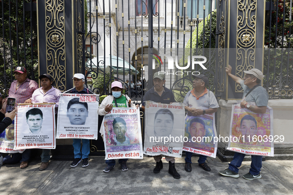 Mothers and fathers of the 43 missing students from Ayotzinapa protest outside the Ministry of the Interior in Mexico City, Mexico, on Septe...