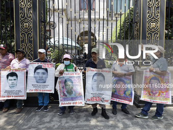 Mothers and fathers of the 43 missing students from Ayotzinapa protest outside the Ministry of the Interior in Mexico City, Mexico, on Septe...