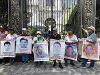 Mothers and fathers of the 43 missing students from Ayotzinapa protest outside the Ministry of the Interior in Mexico City, Mexico, on Septe...