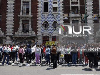 Colleagues of the 43 missing students from Ayotzinapa protest outside the Ministry of the Interior in Mexico City, Mexico, on September 23,...