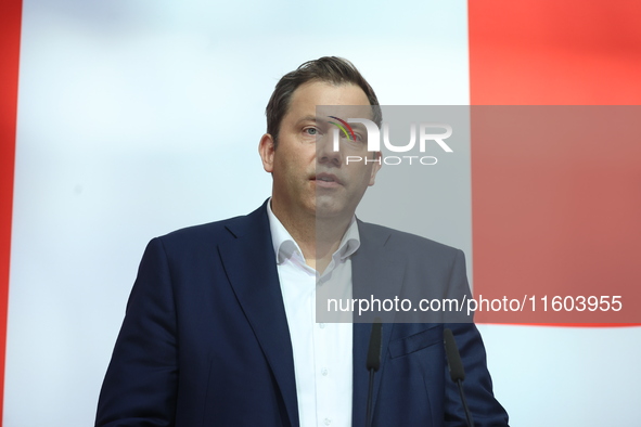 Lars Klingbeil, co-leader of the German Social Democrats, and Dietmar Woidke attend a press conference at SPD federal headquarters after the...