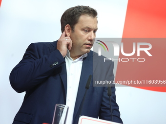 Lars Klingbeil, co-leader of the German Social Democrats, and Dietmar Woidke attend a press conference at SPD federal headquarters after the...