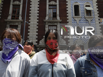 Colleagues of the 43 missing students from Ayotzinapa protest outside the Ministry of the Interior in Mexico City, Mexico, on September 23,...