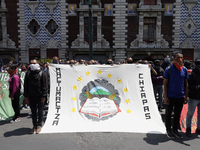 Colleagues of the 43 missing students from Ayotzinapa protest outside the Ministry of the Interior in Mexico City, Mexico, on September 23,...