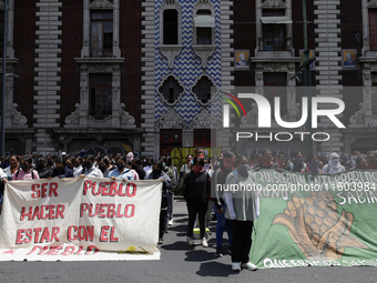 Colleagues of the 43 missing students from Ayotzinapa protest outside the Ministry of the Interior in Mexico City, Mexico, on September 23,...