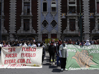 Colleagues of the 43 missing students from Ayotzinapa protest outside the Ministry of the Interior in Mexico City, Mexico, on September 23,...