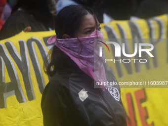 Colleagues of the 43 missing students from Ayotzinapa protest outside the Ministry of the Interior in Mexico City, Mexico, on September 23,...