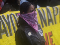 Colleagues of the 43 missing students from Ayotzinapa protest outside the Ministry of the Interior in Mexico City, Mexico, on September 23,...