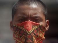 Colleagues of the 43 missing students from Ayotzinapa protest outside the Ministry of the Interior in Mexico City, Mexico, on September 23,...