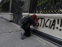 Comrades of the 43 missing students from Ayotzinapa take direct action outside the Ministry of the Interior in Mexico City, Mexico, on Septe...