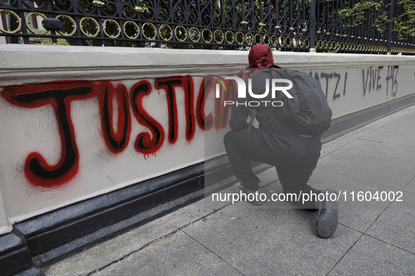 Comrades of the 43 missing students from Ayotzinapa take direct action outside the Ministry of the Interior in Mexico City, Mexico, on Septe...