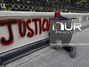 Comrades of the 43 missing students from Ayotzinapa take direct action outside the Ministry of the Interior in Mexico City, Mexico, on Septe...