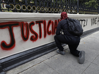 Comrades of the 43 missing students from Ayotzinapa take direct action outside the Ministry of the Interior in Mexico City, Mexico, on Septe...