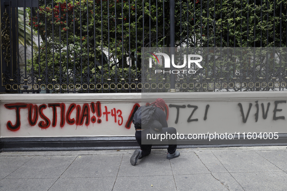 Comrades of the 43 missing students from Ayotzinapa take direct action outside the Ministry of the Interior in Mexico City, Mexico, on Septe...