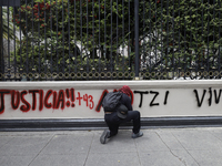 Comrades of the 43 missing students from Ayotzinapa take direct action outside the Ministry of the Interior in Mexico City, Mexico, on Septe...