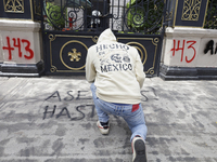 Comrades of the 43 missing students from Ayotzinapa take direct action outside the Ministry of the Interior in Mexico City, Mexico, on Septe...