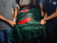 People perform the funeral prayer for Junaid Islam Ratul at the Central Shaheed Minar in Dhaka, Bangladesh, on September 23, 2024. Ratul, wh...