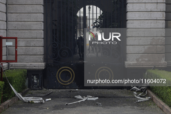 View after the detonation of rockets by comrades of the 43 missing students from Ayotzinapa, outside the Ministry of the Interior in Mexico...