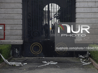 View after the detonation of rockets by comrades of the 43 missing students from Ayotzinapa, outside the Ministry of the Interior in Mexico...