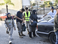 People who flee their villages in southern Lebanon are received at an art institute transformed into a shelter for persons displaced by conf...