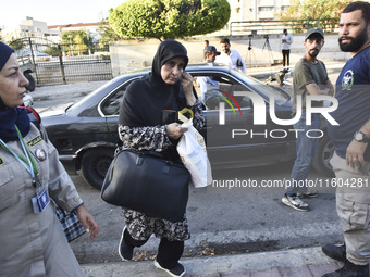 People who flee their villages in southern Lebanon are received at an art institute transformed into a shelter for persons displaced by conf...