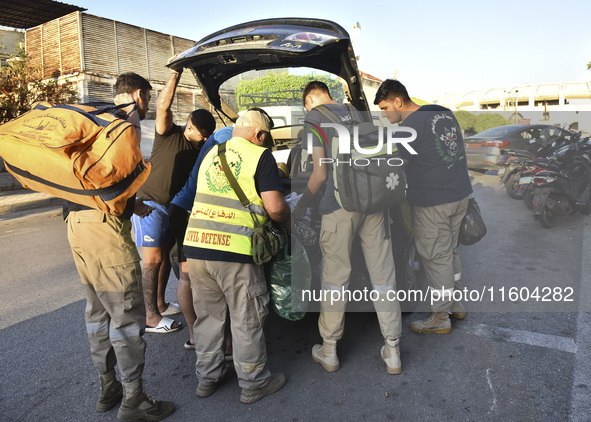 People who flee their villages in southern Lebanon are received at an art institute transformed into a shelter for persons displaced by conf...