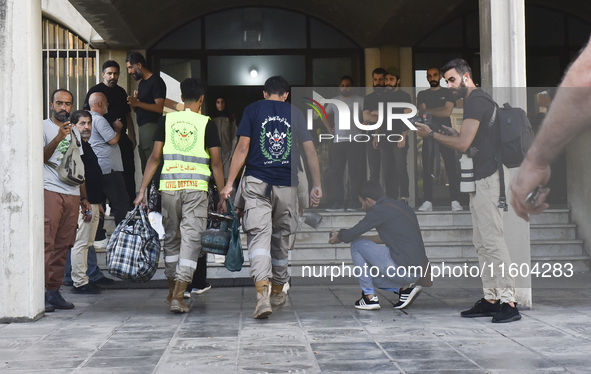 People who flee their villages in southern Lebanon are received at an art institute transformed into a shelter for persons displaced by conf...