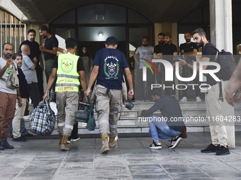 People who flee their villages in southern Lebanon are received at an art institute transformed into a shelter for persons displaced by conf...