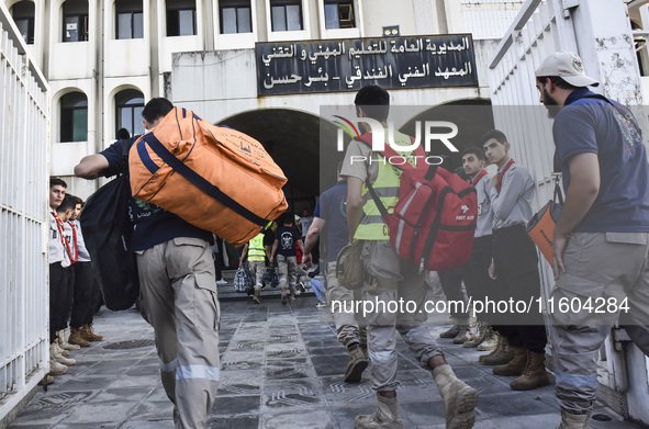 People who flee their villages in southern Lebanon are received at an art institute transformed into a shelter for persons displaced by conf...