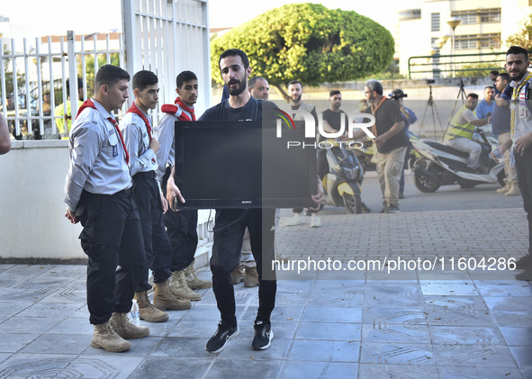 People who flee their villages in southern Lebanon are received at an art institute transformed into a shelter for persons displaced by conf...