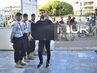 People who flee their villages in southern Lebanon are received at an art institute transformed into a shelter for persons displaced by conf...