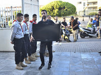 People who flee their villages in southern Lebanon are received at an art institute transformed into a shelter for persons displaced by conf...