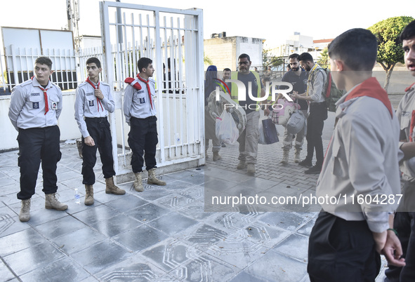 People who flee their villages in southern Lebanon are received at an art institute transformed into a shelter for persons displaced by conf...