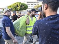 People who flee their villages in southern Lebanon are received at an art institute transformed into a shelter for persons displaced by conf...