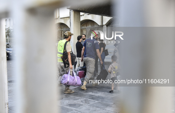 People who flee their villages in southern Lebanon are received at an art institute transformed into a shelter for persons displaced by conf...