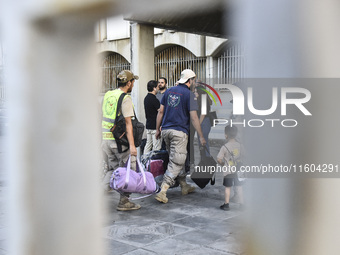 People who flee their villages in southern Lebanon are received at an art institute transformed into a shelter for persons displaced by conf...