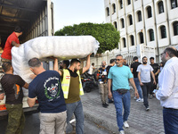 People who flee their villages in southern Lebanon are received at an art institute transformed into a shelter for persons displaced by conf...