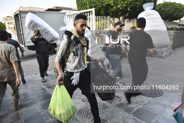 People who flee their villages in southern Lebanon are received at an art institute transformed into a shelter for persons displaced by conf...