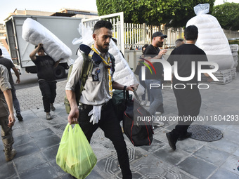 People who flee their villages in southern Lebanon are received at an art institute transformed into a shelter for persons displaced by conf...