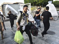 People who flee their villages in southern Lebanon are received at an art institute transformed into a shelter for persons displaced by conf...