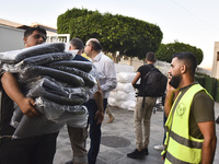 People who flee their villages in southern Lebanon are received at an art institute transformed into a shelter for persons displaced by conf...