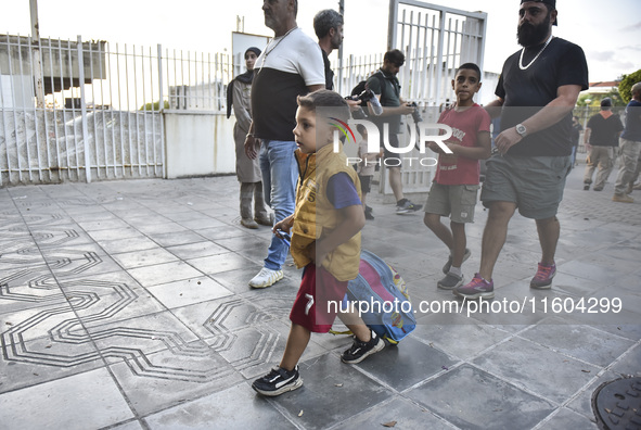 People who flee their villages in southern Lebanon are received at an art institute transformed into a shelter for persons displaced by conf...