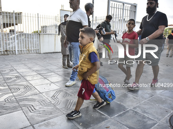 People who flee their villages in southern Lebanon are received at an art institute transformed into a shelter for persons displaced by conf...